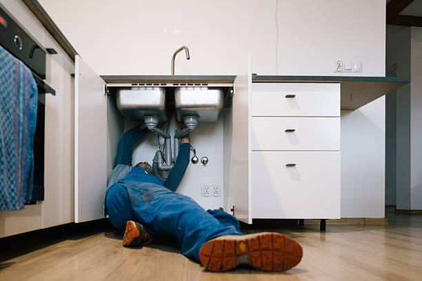 Professional Drain Cleaning technician working in Key West, FL
